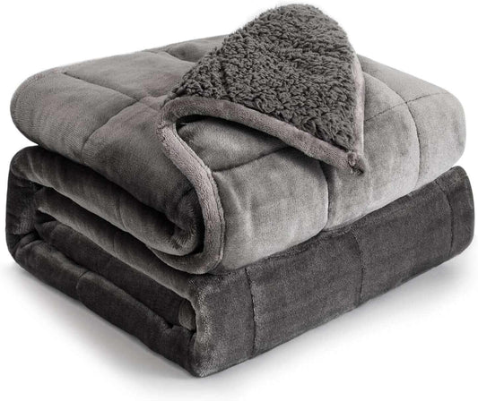Folded gray ultra-cozy sherpa weighted blanket with soft plush texture and breathable fabric for anxiety relief and better sleep