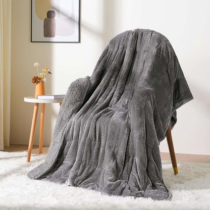 Bare Weighted Blanket draped over a chair in a cozy room, showcasing its soft and breathable fabric.